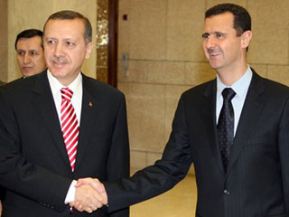 Turecký premiér Erdogan (vlevo) působí jako prostředník. Turecký premiér Erdogan (vlevo) působí jako prostředník.