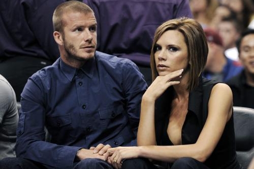 Fotbalista David Beckham a jeho manželka Victoria. Fotbalista David Beckham a jeho manželka Victoria.