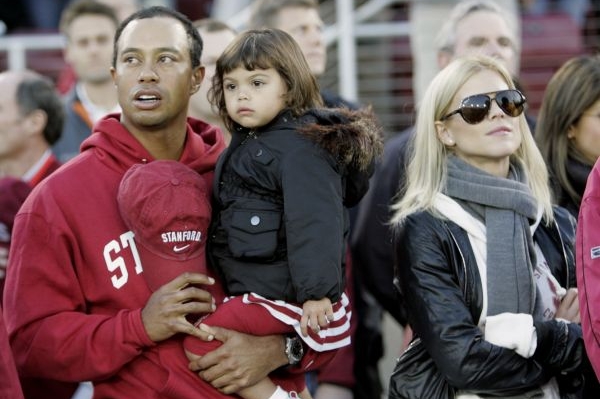 Tiger Woods s manželkou a dcerkou. 