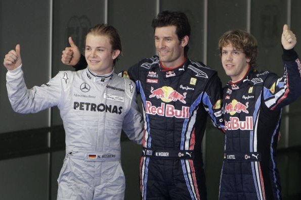 Vítězná trojka Vettel, Weber a Rosberg (zleva).
