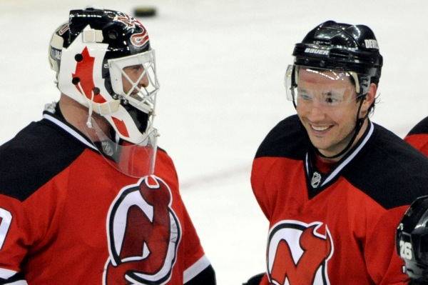 Ilja Kovalčuk (vpravo) s brankářem Brodeurem z New Jersey.