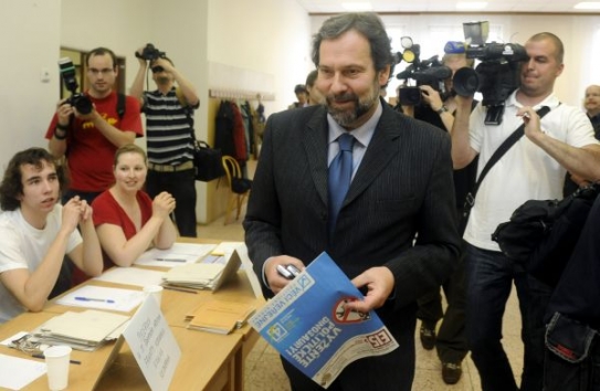 Předseda Věcí veřejných Radek John.