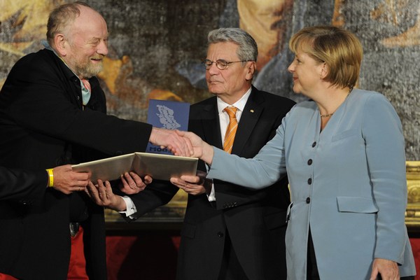 Angela Merkelová se nebojí podpořit Kurta Westergaarda (vlevo).