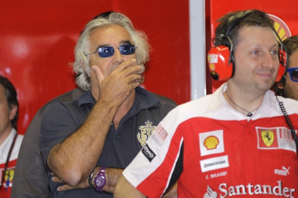 Flavio Briatore (vlevo) jako host Ferrari v Monze.