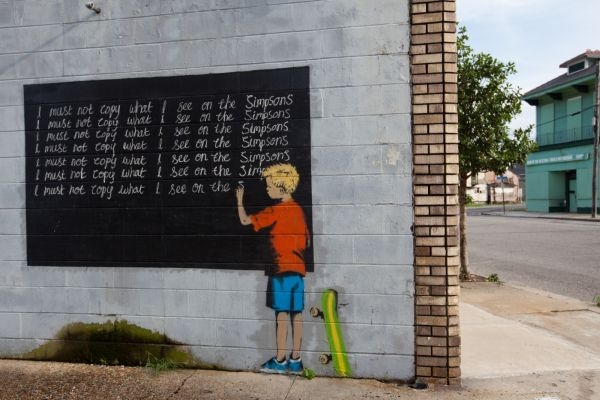 Banksy se Simpsonovými koketoval už dříve, na svém letošním graffiti, které nasprejoval na dům v New Orleansu.