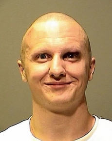 Jared Lee Loughner se u soudu i pousmál, nic moc neřekl.