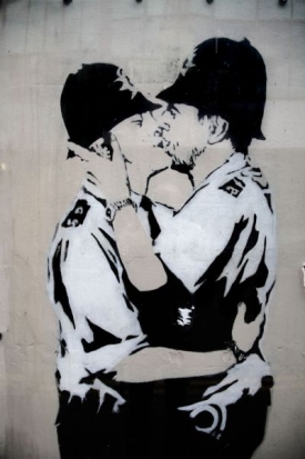 Banksyho graffiti z britského města Bristol. 