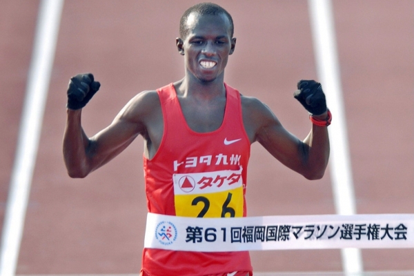 Samuel Wanjiru na archivním snímku. Samuel Wanjiru na archivním snímku.