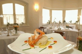 Michelinská restaurace Kuppelrain láká na sezonní menu.