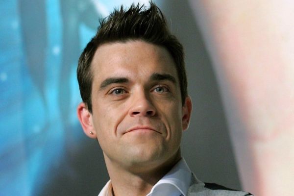 Zpěvák Robbie Williams. Zpěvák Robbie Williams.