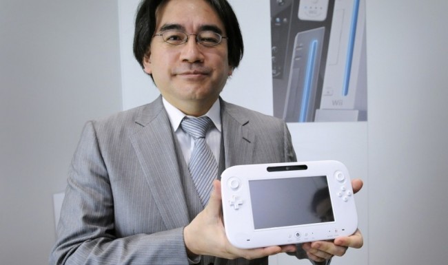 Prezident firmy Nintendo s konzolí Wii U.
