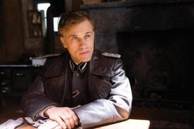 Christopher Waltz jako plukovník Landa v Hanebných panchartech.