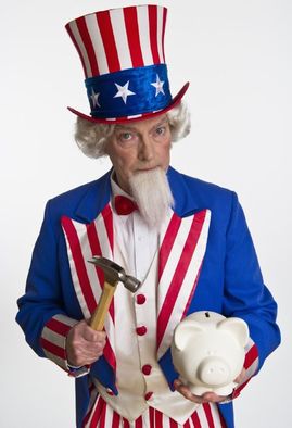 Rozbít prasátko, tisknout další peníze...? USA mají zásadní dilema. 