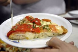 Argentinská pizza El Cuartito.