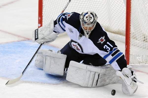 Gólman Ondřej Pavelec v brance Winnipegu. Gólman Ondřej Pavelec v brance Winnipegu.