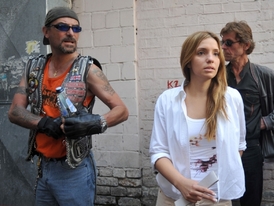 Tymošenková mladší s manželem, metalovým zpěvákem Seanem Carrem.