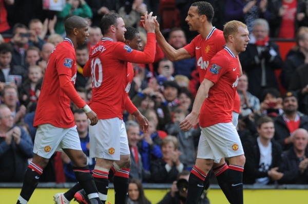 Fotbalisté Manchesteru United se radují z gólu. Fotbalisté Manchesteru United se radují z gólu.