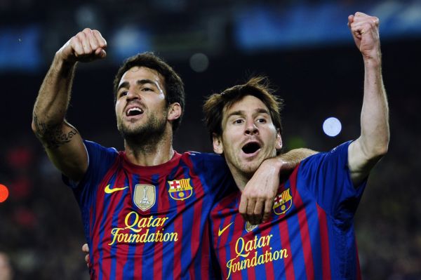 Radost fotbalistů Barcelony Cesca Fabregase a Lionela Messiho.