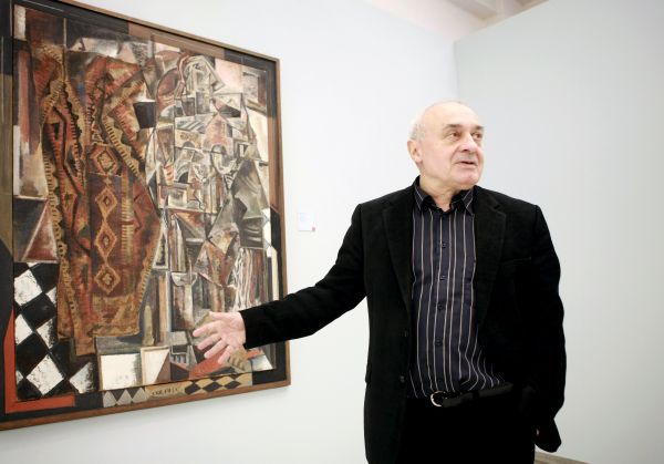 Tomáš Vlček z Národní galerie u Fillova obrazu Žena s kobercem.