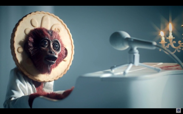 Zpívající opičák v reklamě na sušenky. Zpívající opičák v reklamě na sušenky.