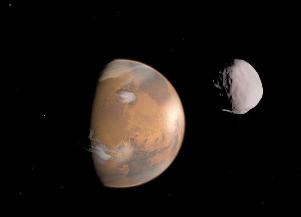 Mars a jeho měsíc Deimos. Mars a jeho měsíc Deimos.