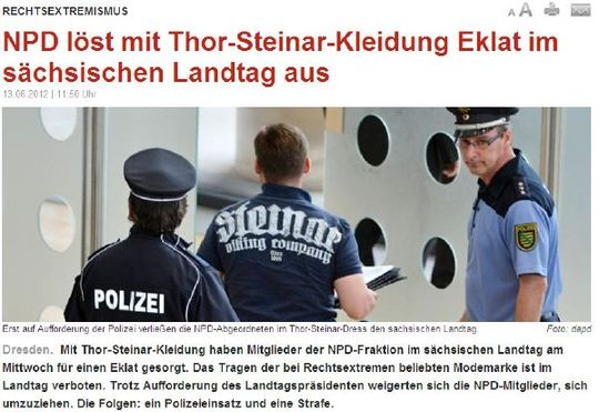 Záběr policie odvádějící poslance NPD (reprobez derwesten.de). Záběr policie odvádějící poslance NPD (reprobez derwesten.de).