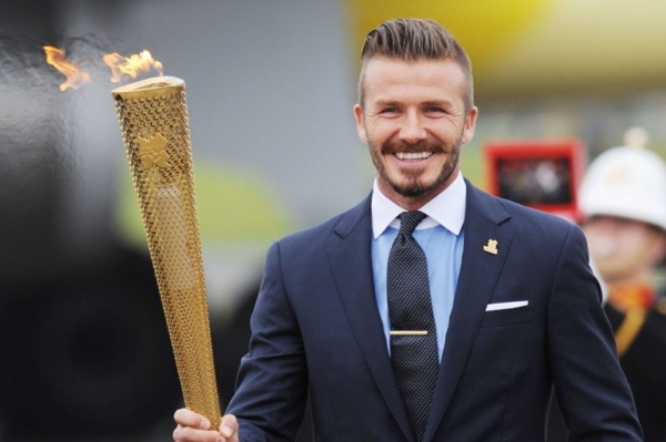 David Beckham s olympijskou pochodní.