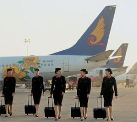 Stevardky u řady letadel společnosti Hainan.