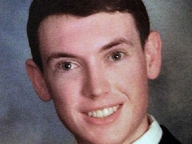 Zadržený střelec James Holmes.