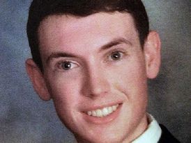 Masový vrah James Holmes.