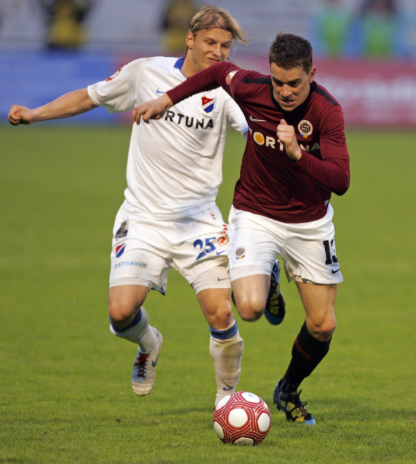 Tomáš Mičola (v bílém). Tomáš Mičola (v bílém).