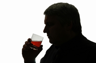 Konzumace alkoholu.