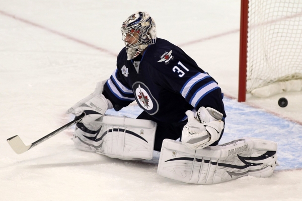 Ondřej Pavelec okusí českou extraligu v dresu Třince.