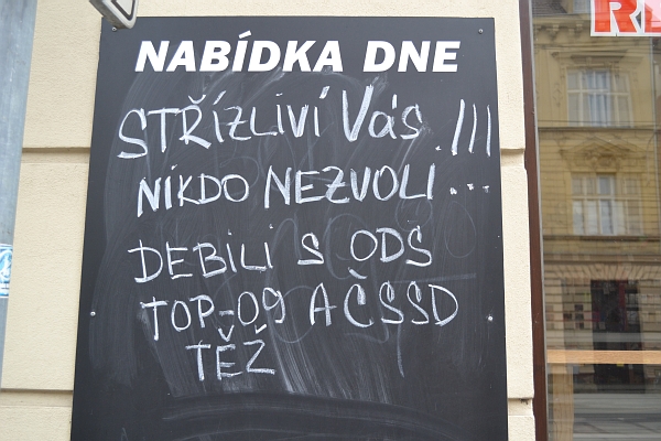 Nápis na tabuli řeznictví Mária Dluhoše z Ostravy-Přívozu.