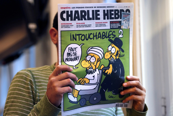 Odvážní Francouzi. Nová karikatura Mohameda v časopisu Charlie Hebdo.
