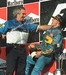 Do velkého světa kolotoče formule 1 ho přivedl boss stáje Benetton Flavio Briatore. Sázka na tehdy dvaadvacetiletého mladíka mu vyšla. Schumacher začal za Benetton závodit v roce 1991, v letech 1994 a 1995 zajistil svému týmu dva tituly. (Foto: Profimedia) Do velkého světa kolotoče formule 1 ho přivedl boss stáje Benetton Flavio Briatore. Sázka na tehdy dvaadvacetiletého mladíka mu vyšla. Schumacher začal za Benetton závodit v roce 1991, v letech 1994 a 1995 zajistil svému týmu dva tituly. (Foto: Profimedia)