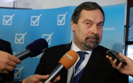 Předseda Věcí veřejných Radek John.
