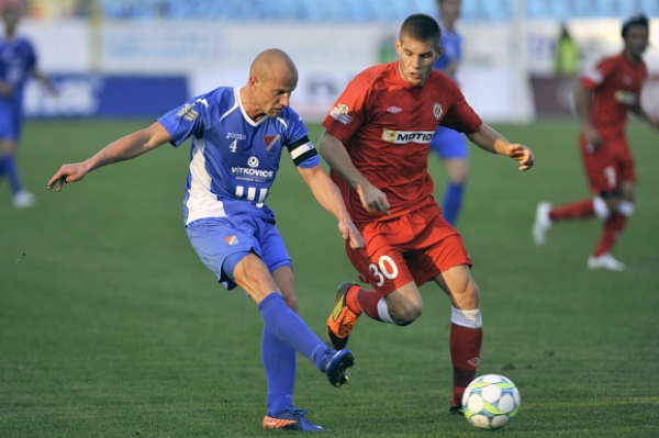 Kapitán Baníku Ostrava Martin Lukeš (vlevo).