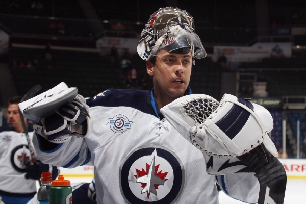 Ondřej Pavelec vyměnil kvůli stávce v NHL dres Winnipegu za trikot Bílých Tygrů.
