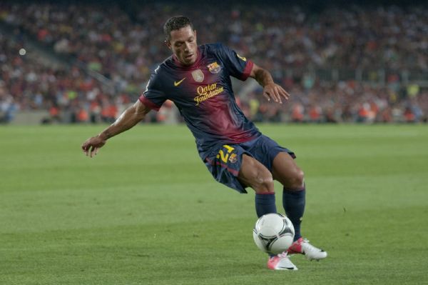 Hráč Barcelony Adriano. 