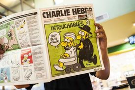 Prorok na titulce Charlie Hebdo ve zvláštním vydání loni.