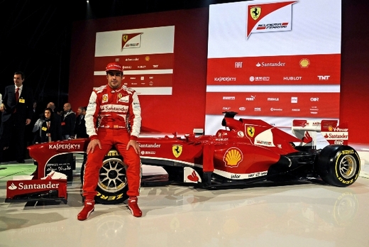 Fernando Alonso s novým monopostem stáje Ferrari (Foto: ČTK/AP/Ercole Colombo).