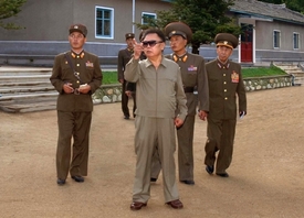 Kim Čong-il s přáteli.