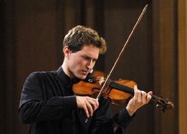 Hlavní koncertní mistr České filharmonie, houslista Filip Špaček.
