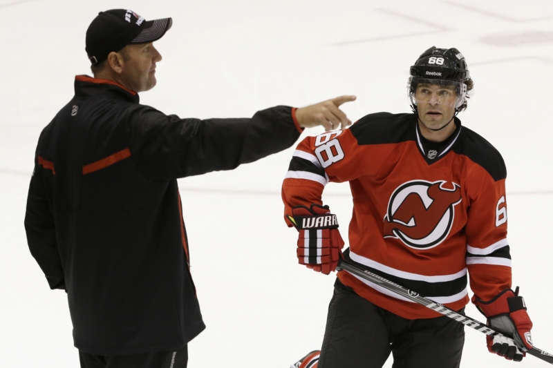 Jaromír Jágr a trenér Devils Peter DeBoer.