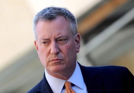 Kandidát Bill de Blasio.
