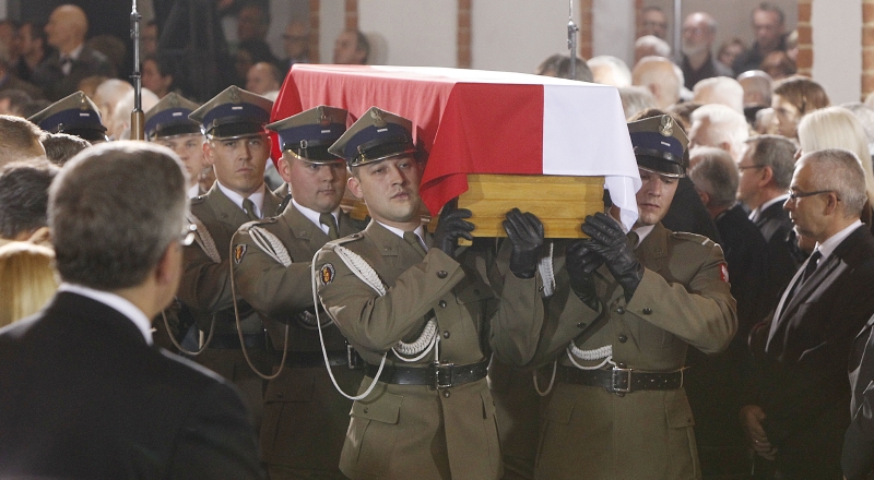 Momentka z pohřbu.