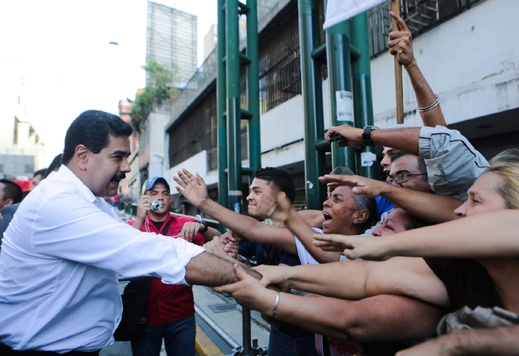 Příznivci venezuelského prezidenta na demonstraci odborů v Caracasu. Příznivci venezuelského prezidenta na demonstraci odborů v Caracasu.