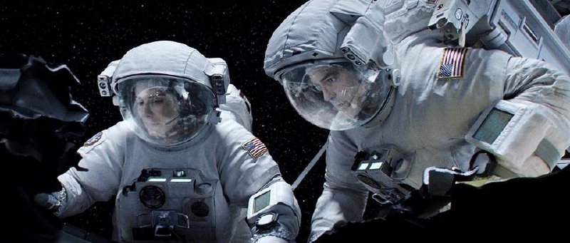 Sandra Bullocková a George Clooney ve snímku Gravitace. Sandra Bullocková a George Clooney ve snímku Gravitace.