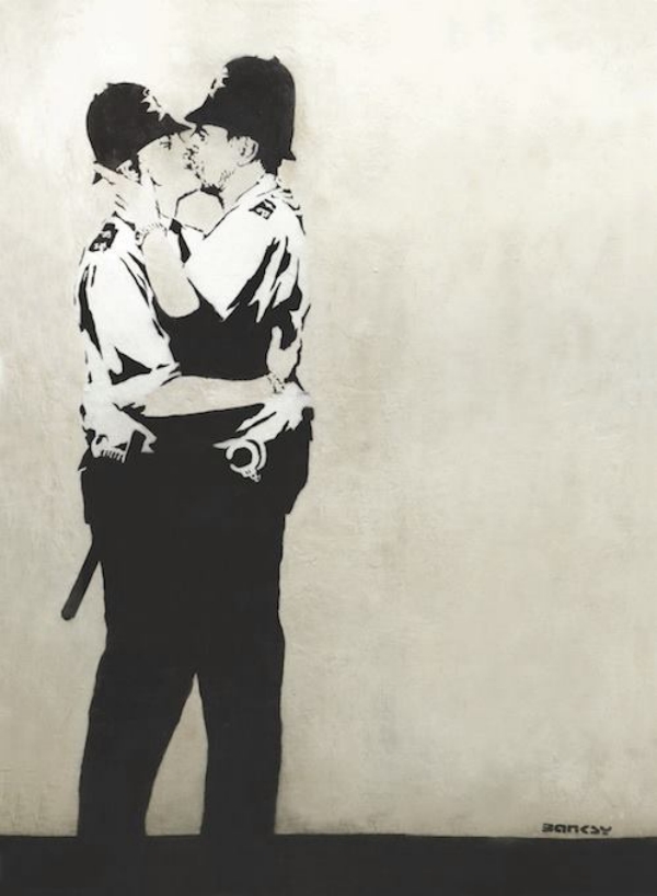 Kissing Coppers Banksy původně nastříkal na zeď v Brightonu. Kissing Coppers Banksy původně nastříkal na zeď v Brightonu.